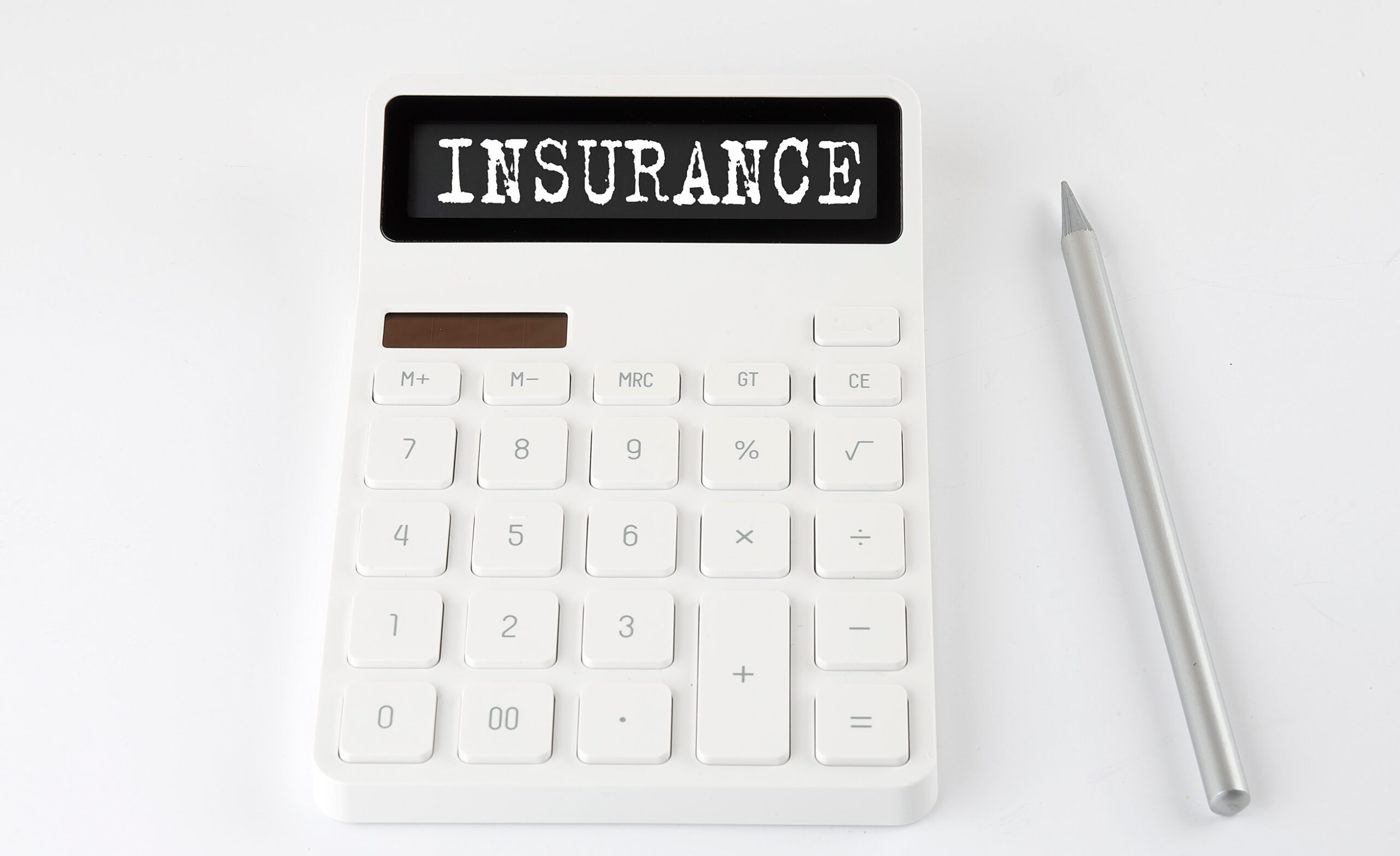 A white calculator with the word